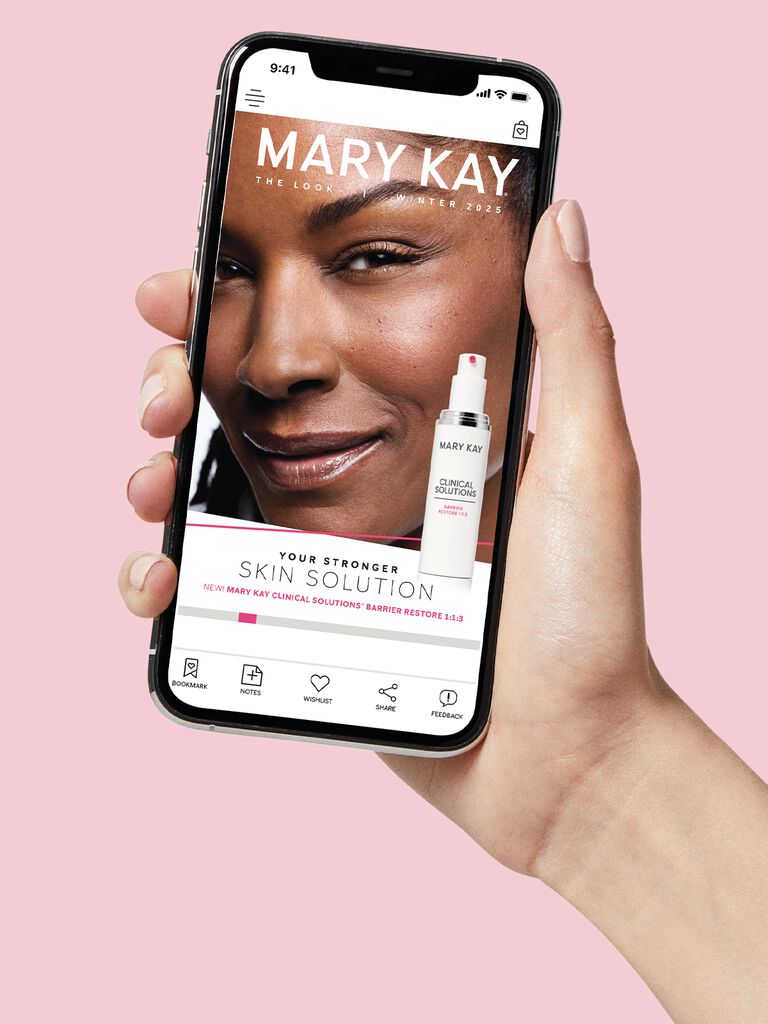 dark-skinned hand hold phone with a Mary Kay barrier restore promotion showing